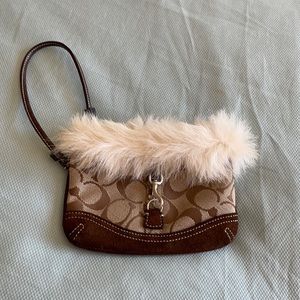 Coach -small wristlet or change purse.  Excellent condition. $13